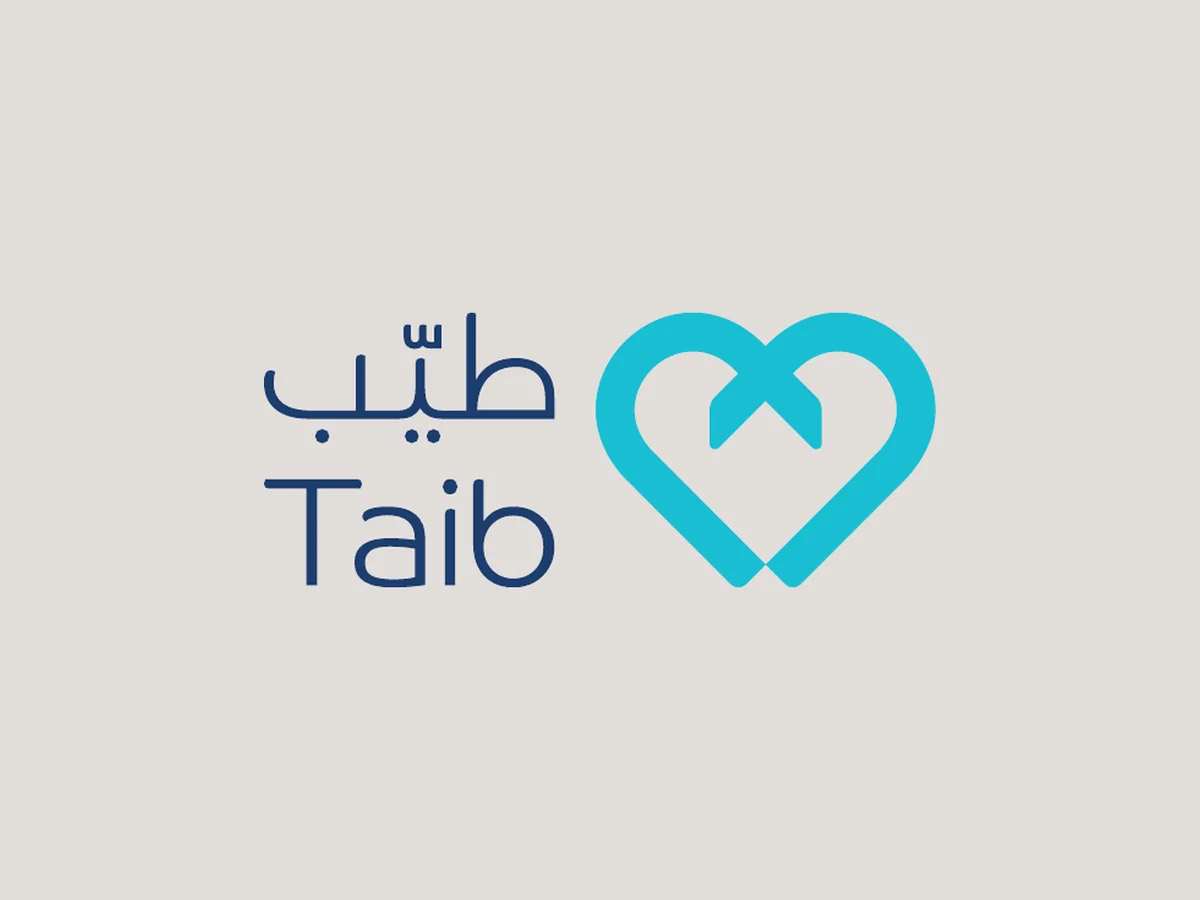 Taib logo: turquoise heart mark with Arabic and English wordmark